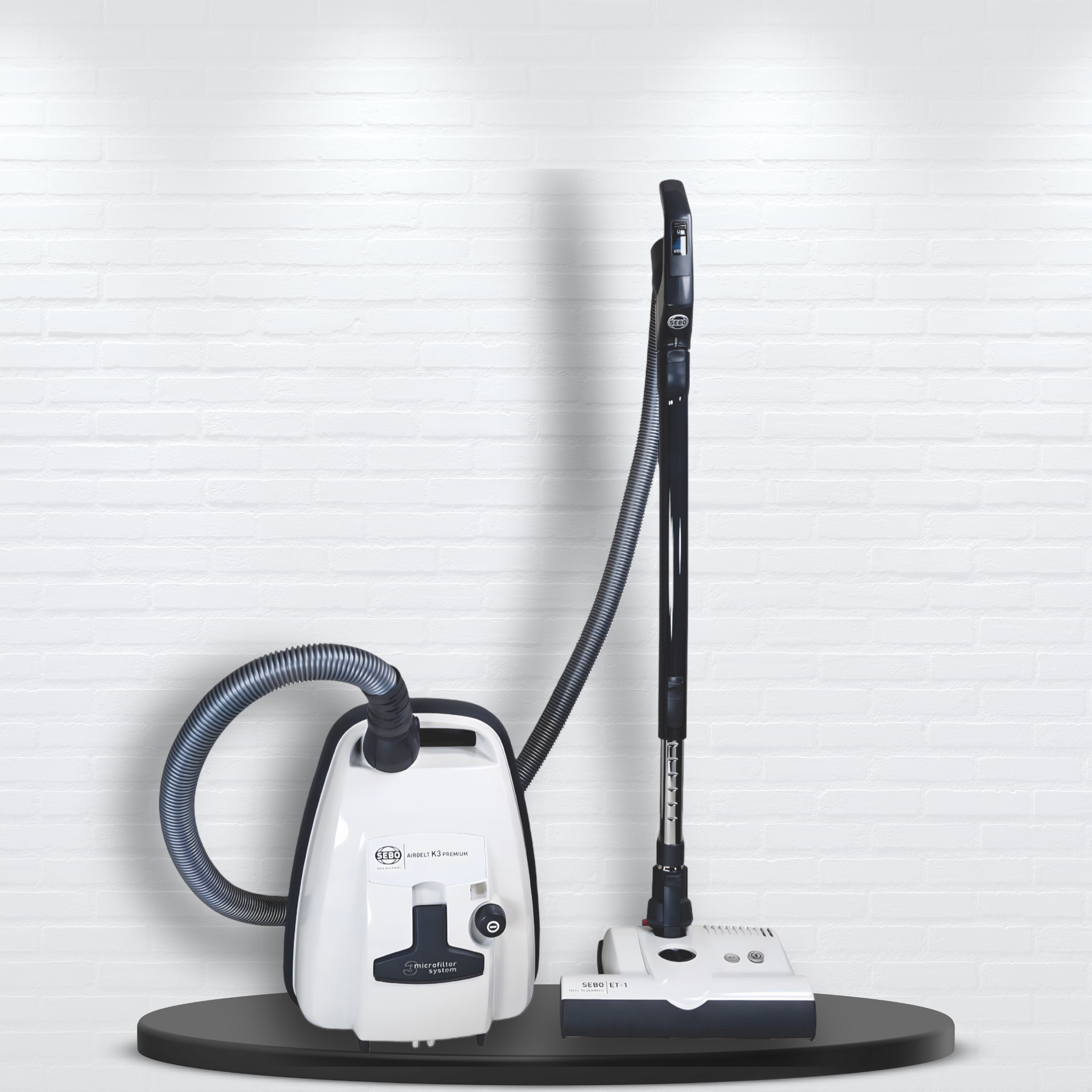 Sebo airbelt K3 Premium with parquet for pet hair and hardwood floors sitting on table