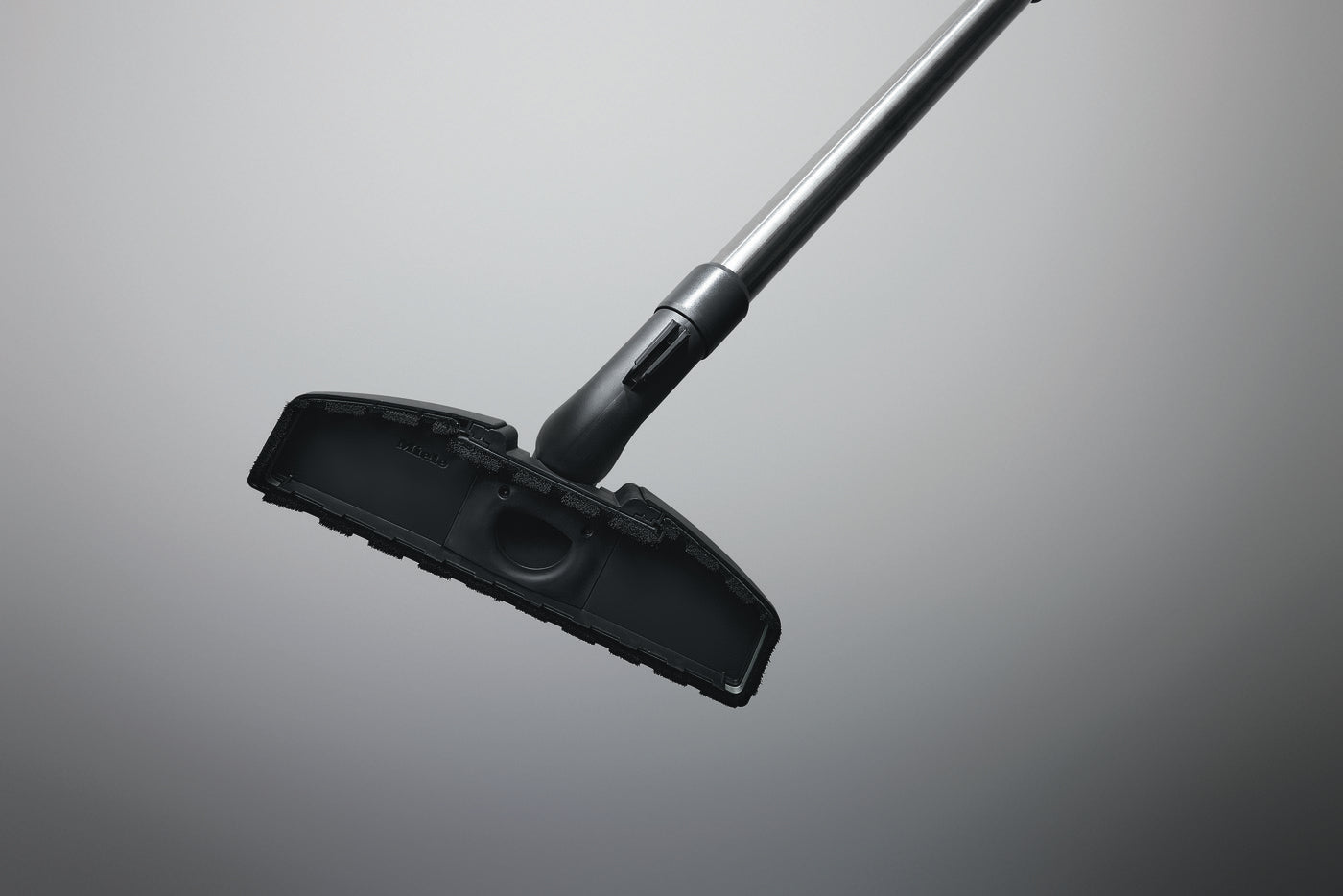 Miele Parquet twister tool as seen from floor up while being used
