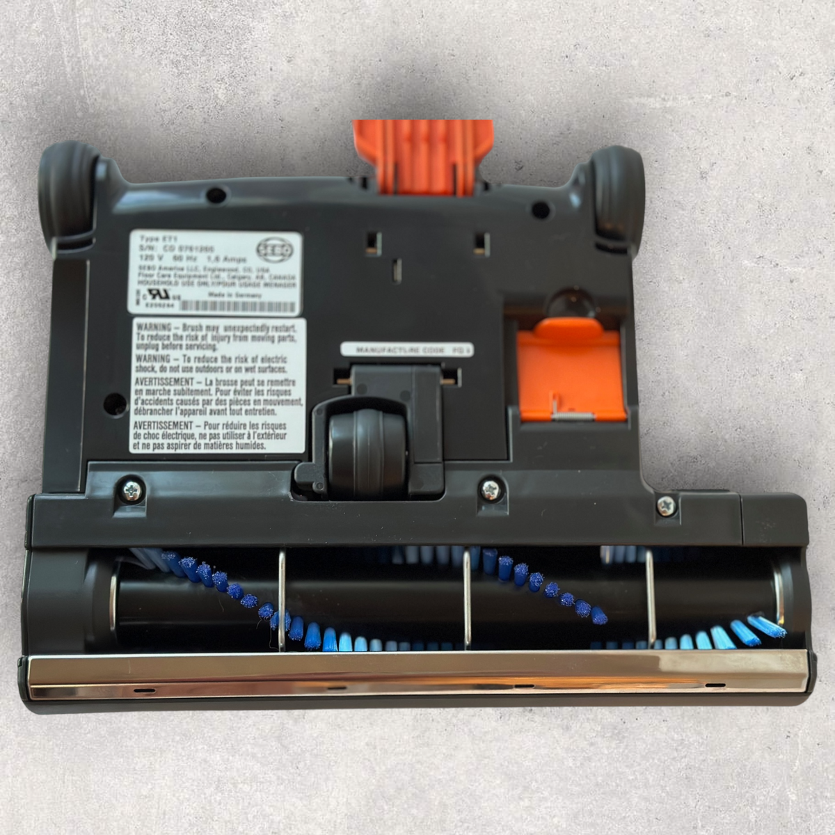 Bottom of Sebo ET-1 powerhead with brush roll designed for hardwood floors
