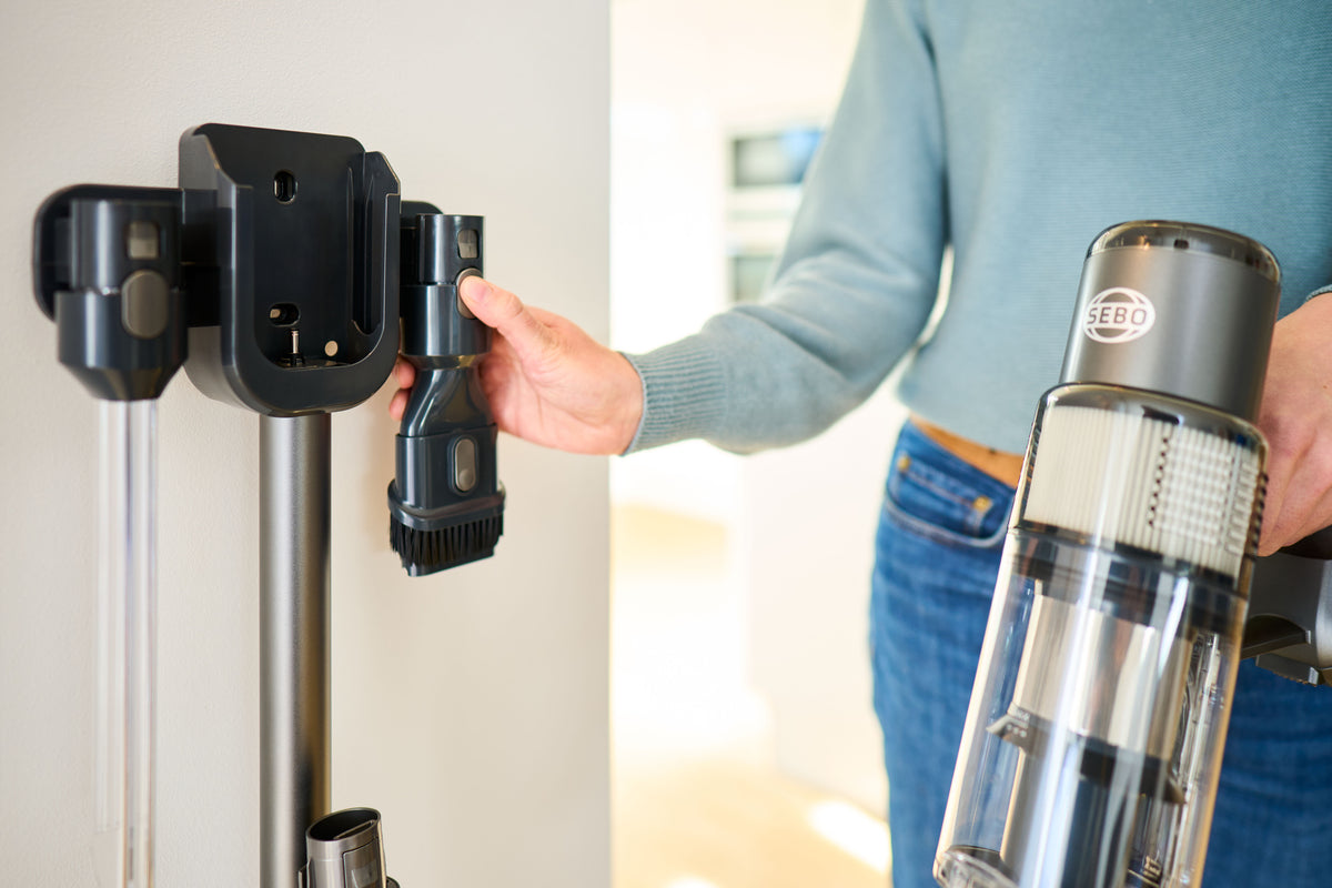 SEBO Balance A1 dusting brush holder on the wall mount.