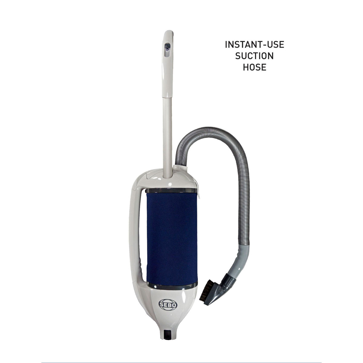 SEBO Dart upright vacuum with its instant-use suction hose extended.