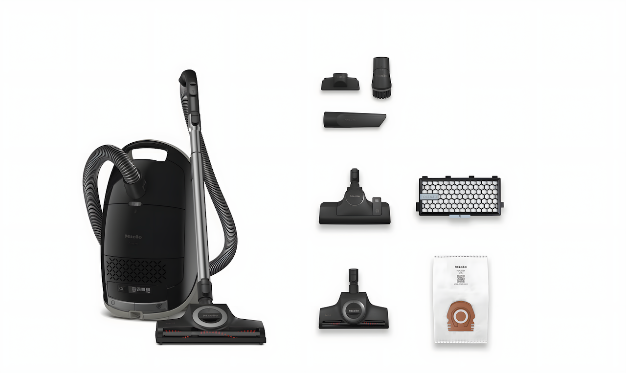 Miele Guard M1 Cat & Dog canister vacuum, Upholstery nozzle, Crevice nozzle, Dust brush, Floorhead SBD 365-3, Turbobrush STB 305-3, and a HyClean Air CO vacuum bag.
