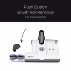 SEBO ET-1 powerhead brush roll removal demonstration with a black header reading 'Push Button Brush Roll Removal (No Tools Needed)'. The main product is white and dark gray, with a detached black brush roll cap shown beside it on a white background.