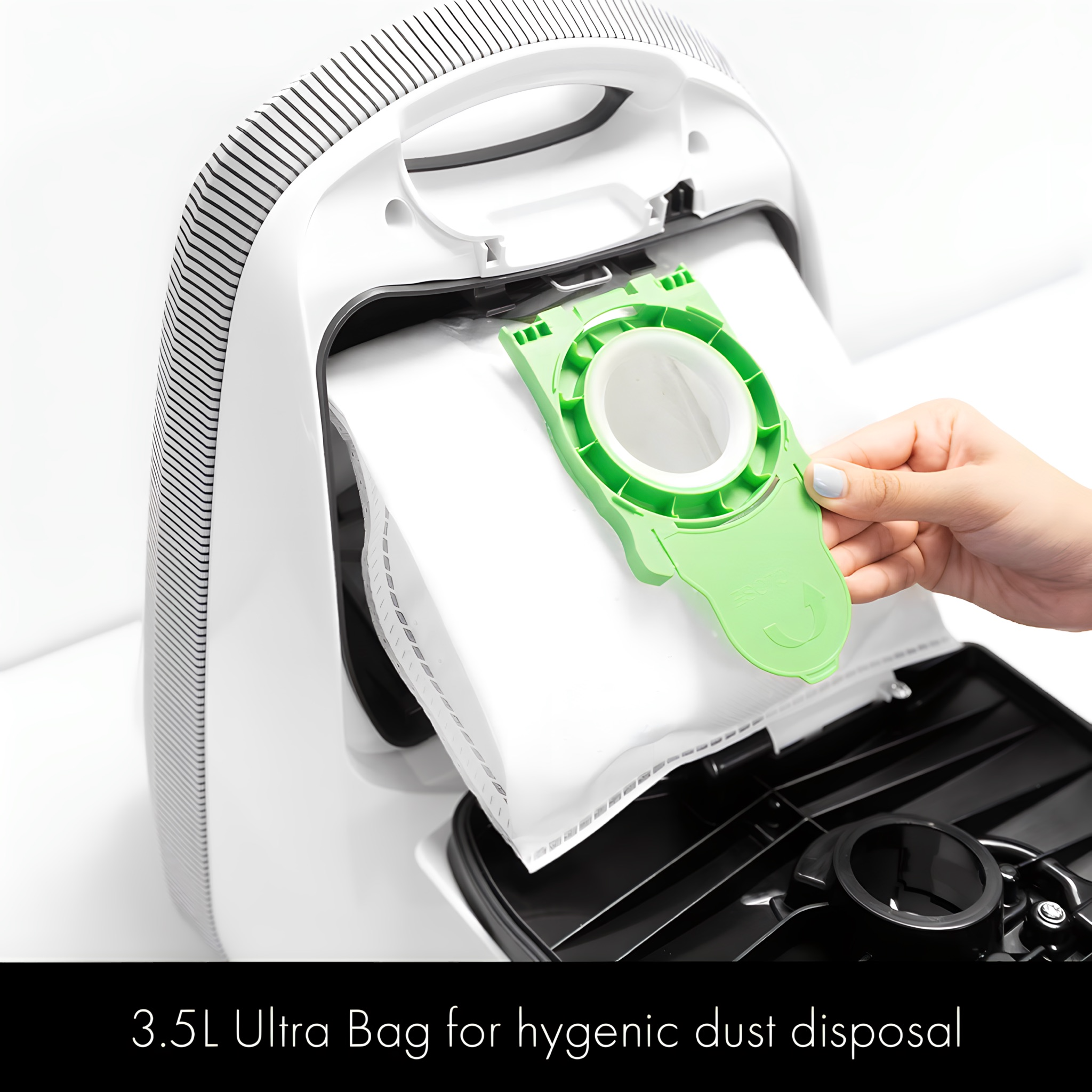 White Sebo vacuum open showing easy bag changes