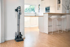 SEBO Balance A1 on its tool storage stand in a kitchen.