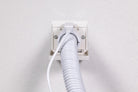 Nutone wall inlet with Nutone hose attached giving power from a local electrical outlet to bring power to the powerhead for carpets 