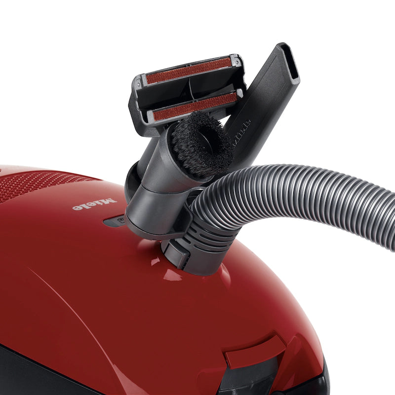 Onboard tool storage on the Miele Classic C1 Pure Suction HomeCare.