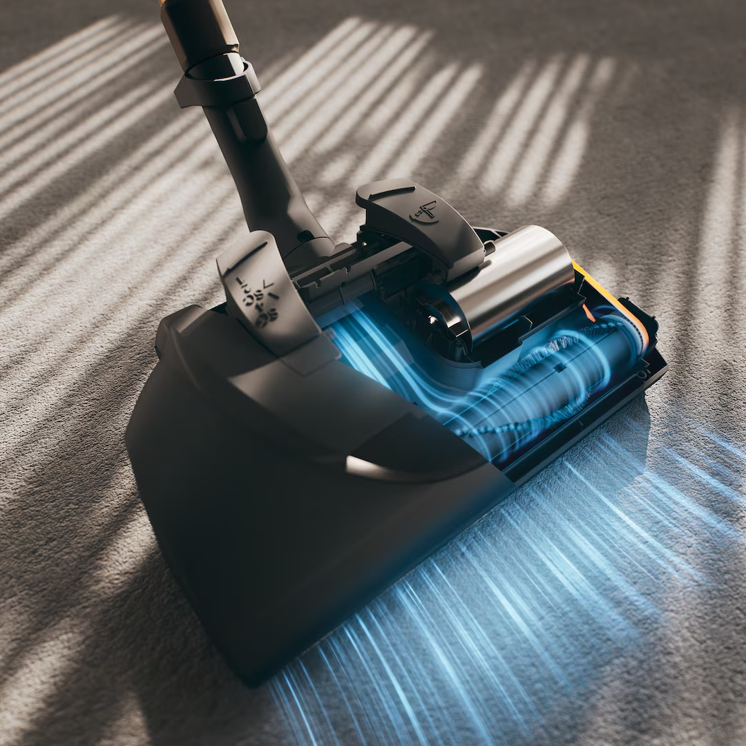 Miele Electro Plus floorbrush with LED light cleaning a rug.