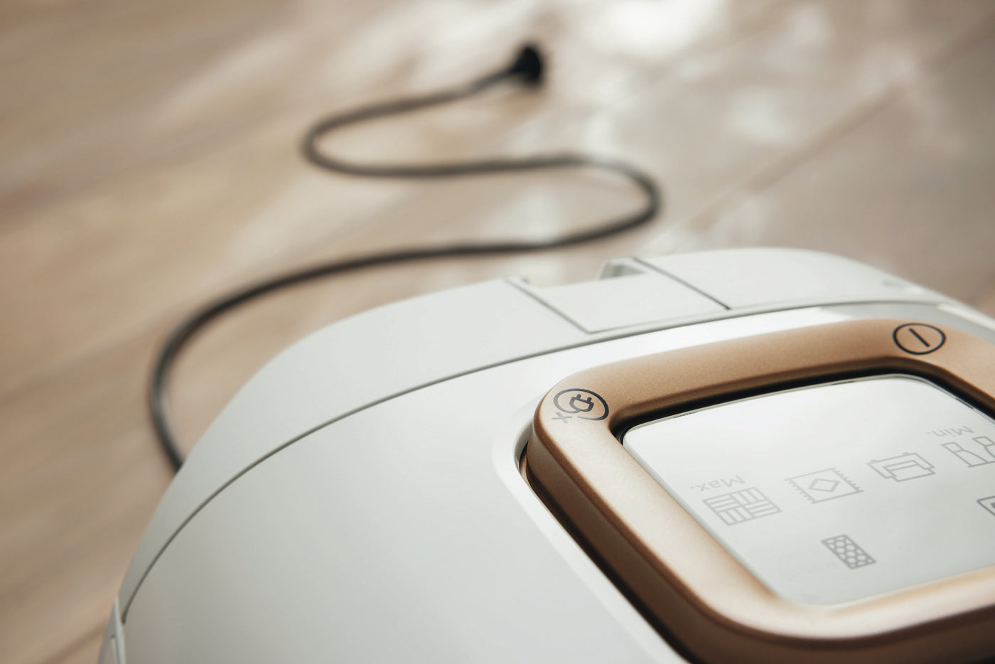 Miele Guard automatic cord rewinder.