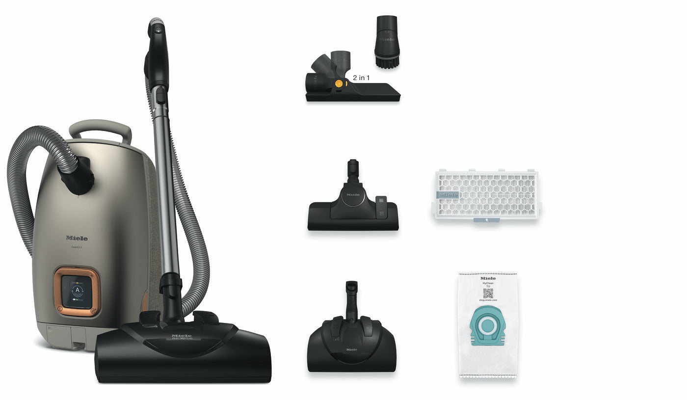 Miele Guard L1 Electro in Titanium with its accessories, bag and filter.