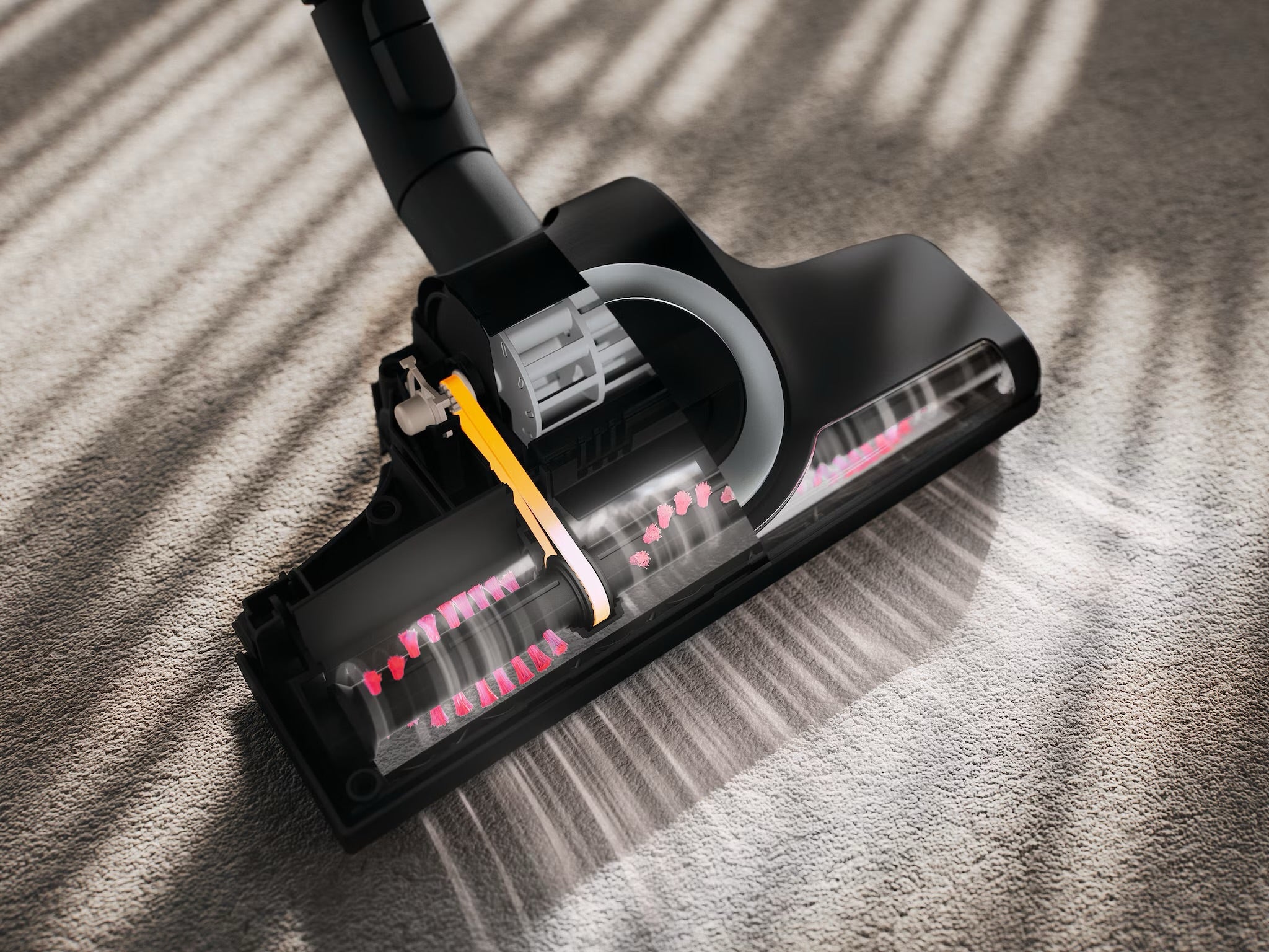 Close-up of the Miele Guard M1 Cat & Dog's Turbobrush floorhead on carpet.