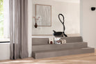 Miele Guard M1 canister on a staircase landing.