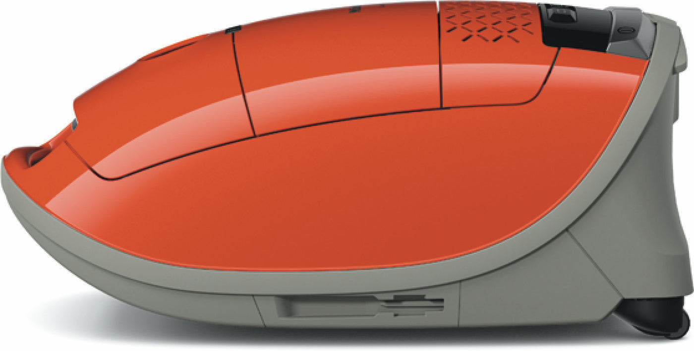 Close-up of the red Miele Guard M1 Terra Red canister vacuum's lid and handle.