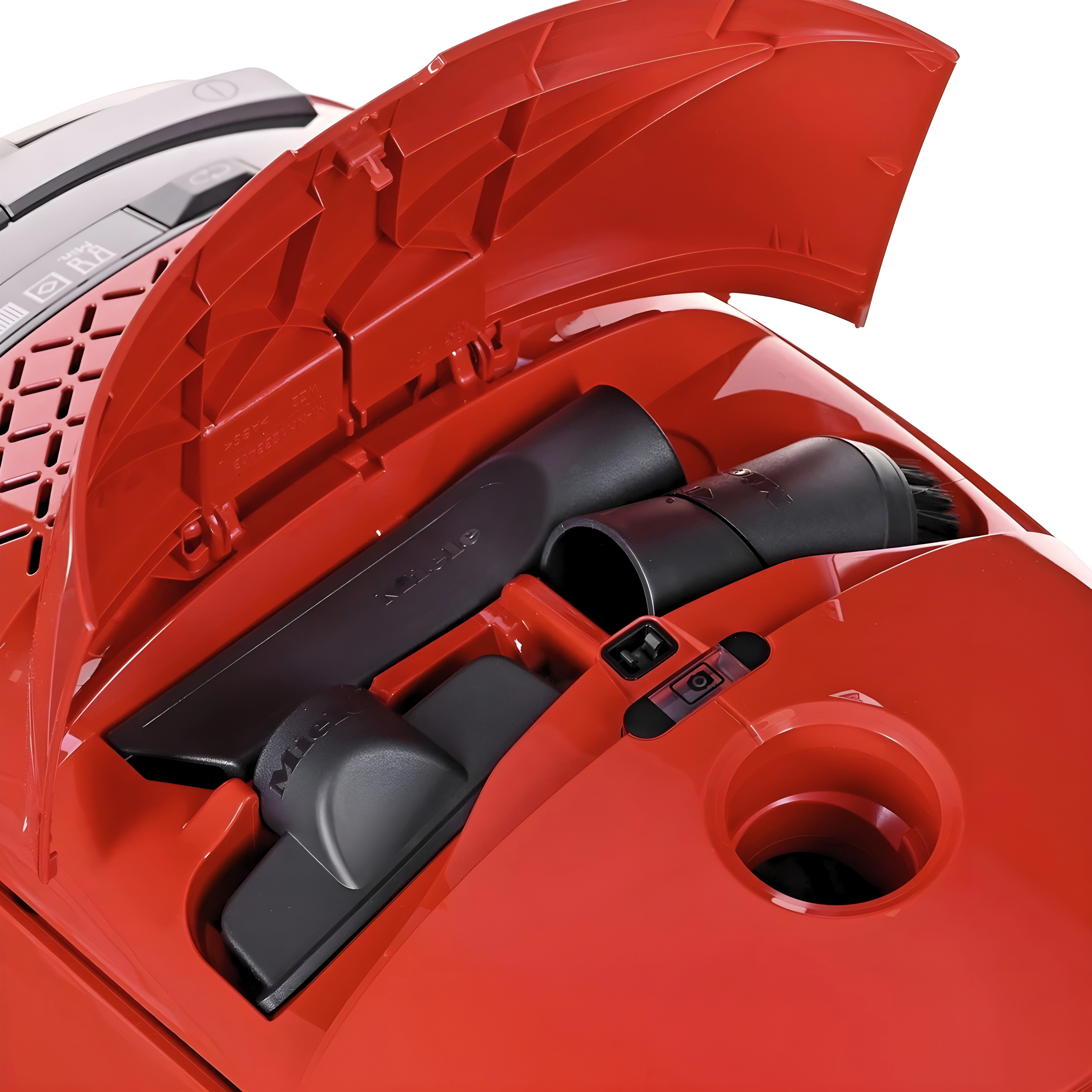 Onboard tool storage on the Miele Guard M1 in Terra Red.