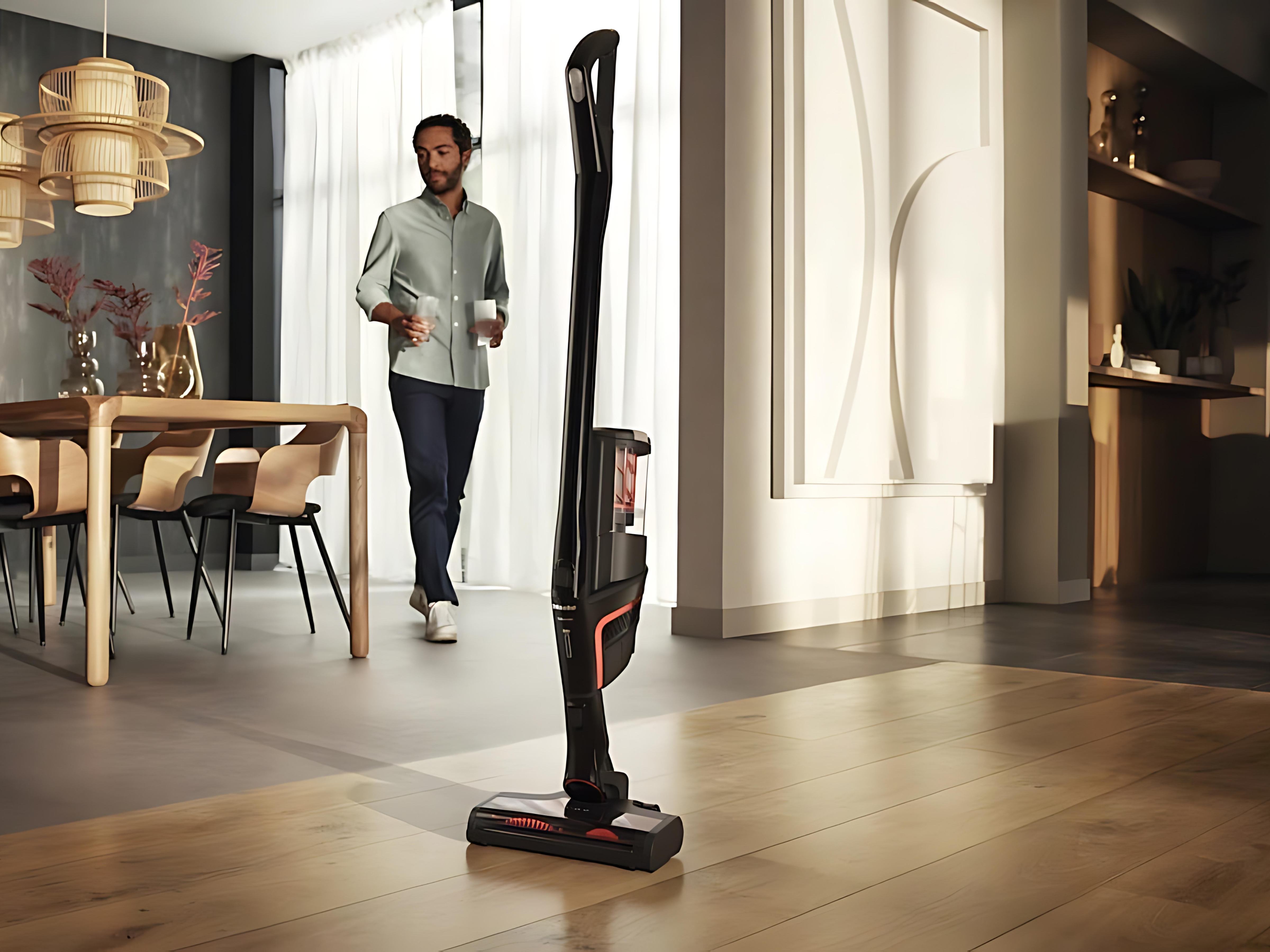 Miele Triflex HX1 Facelift standing on its own in a dining room.