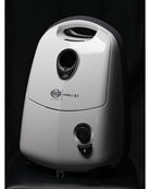 Close-up of the white SEBO Airbelt E1 Kombi canister vacuum's front panel and logo.