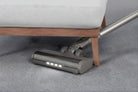 SEBO Balance A1 low-profile LED powerhead reaching under a bed.