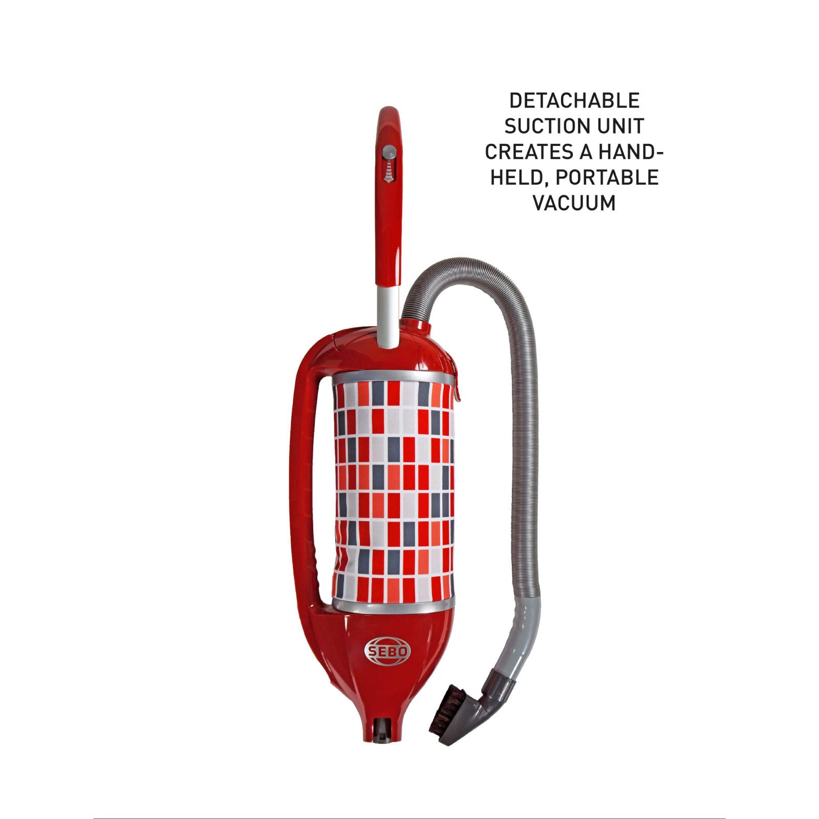 Red and white checkered SEBO Felix Premium upright vacuum with its detachable suction unit removed to use as a handheld, portable vacuum.