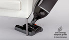 SEBO Felix Premium's handheld suction unit being used to clean carpeted stairs.